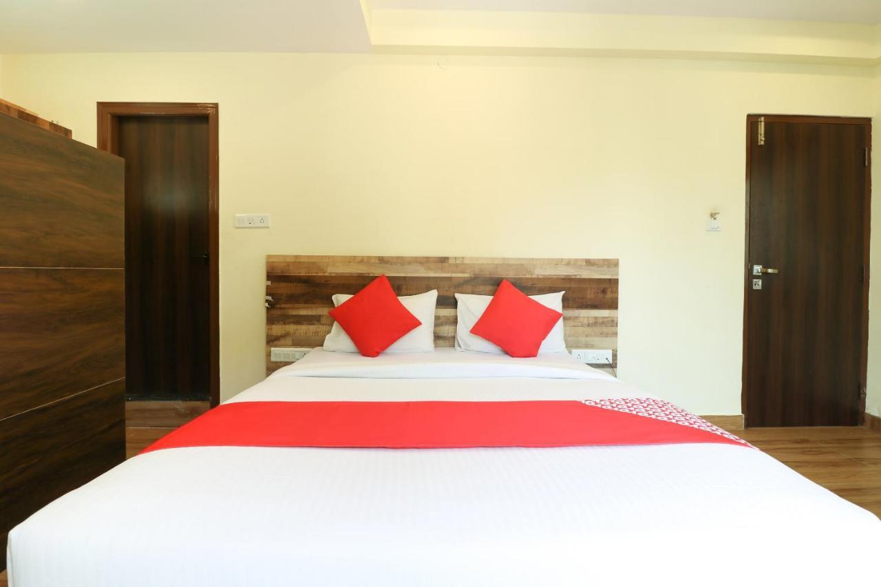 Oyo 36197 Royal Wood Hotel Bangalore Esterno foto